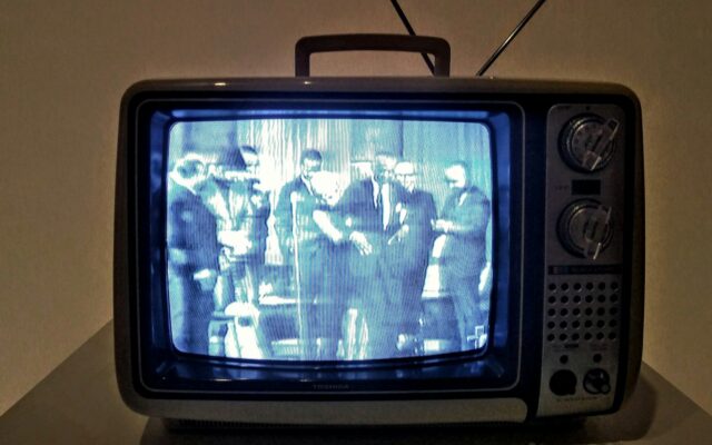 The Emergence of the Idiot Box black crt tv turned on on white table